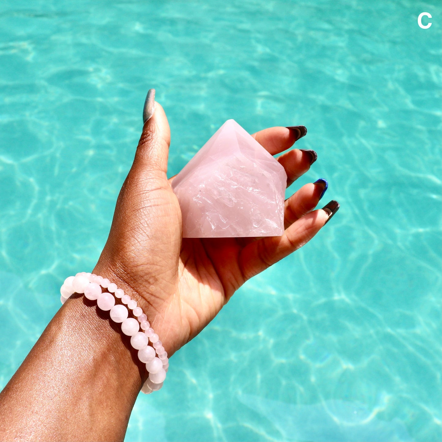 large rose quartz standing point with cut base