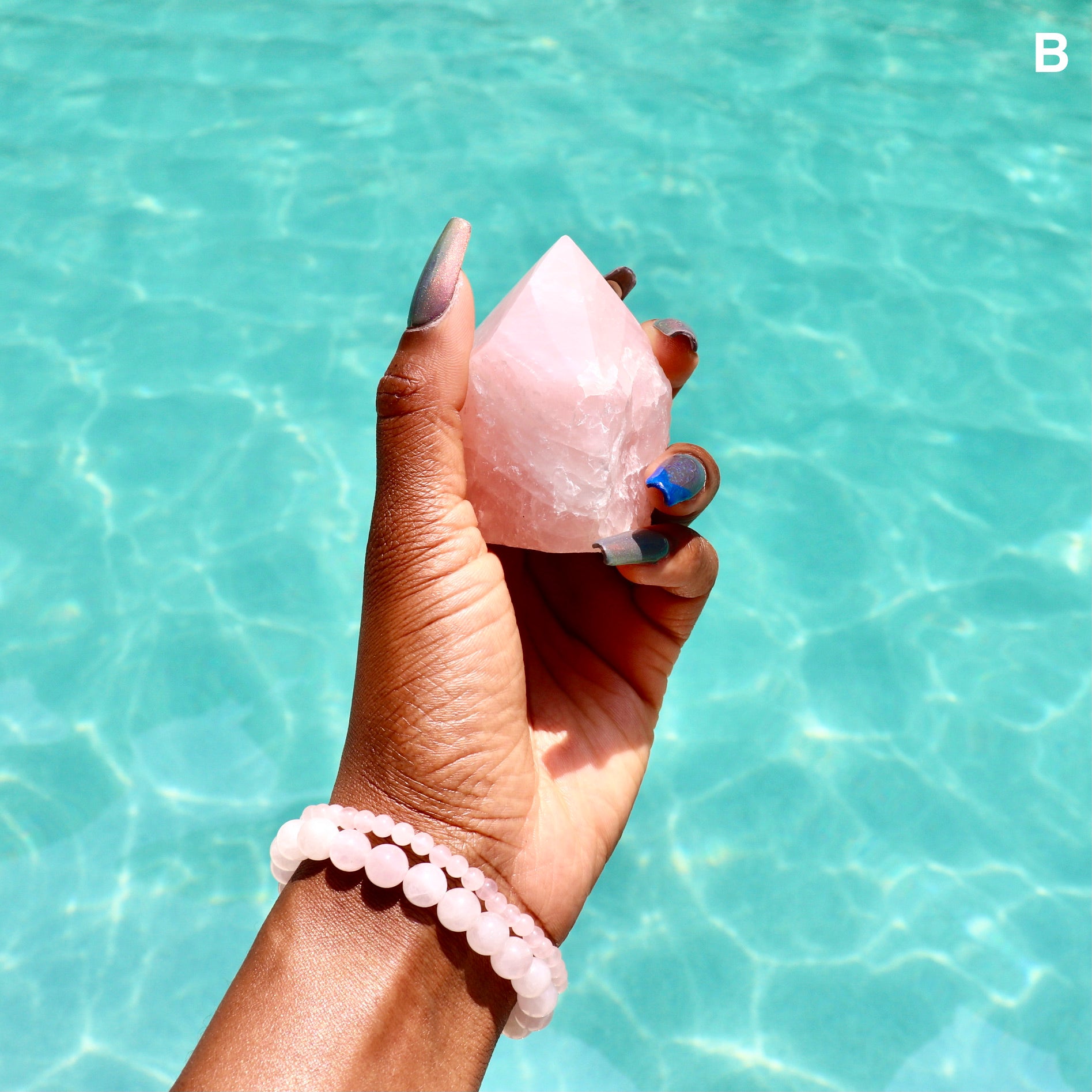 large rose quartz standing point with cut base