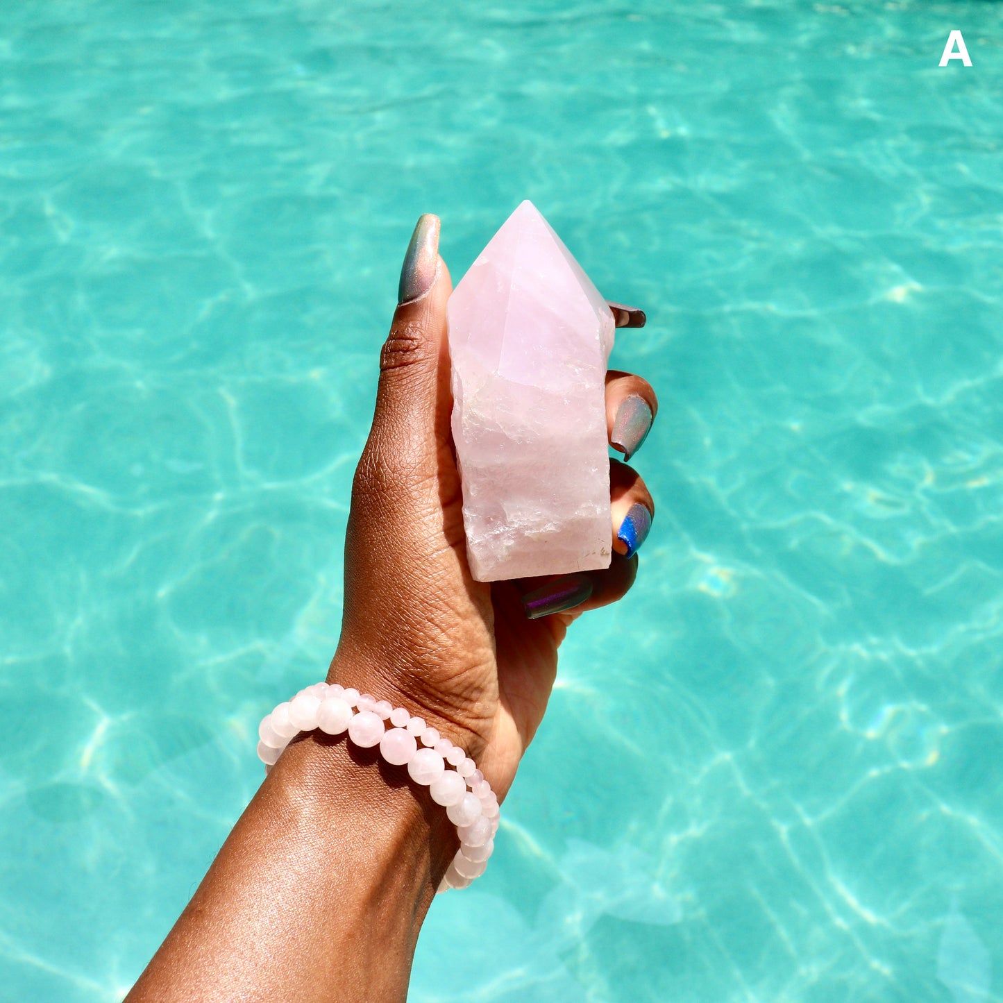 large rose quartz standing point with cut base