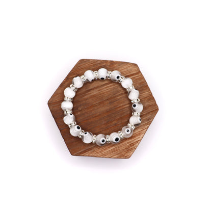 Evil Eye Elastic Protection Bracelet made with glass beads white