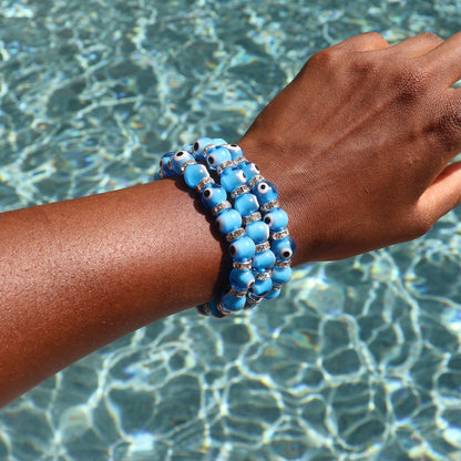 Evil Eye Elastic Protection Bracelet made with glass beads aqua blue