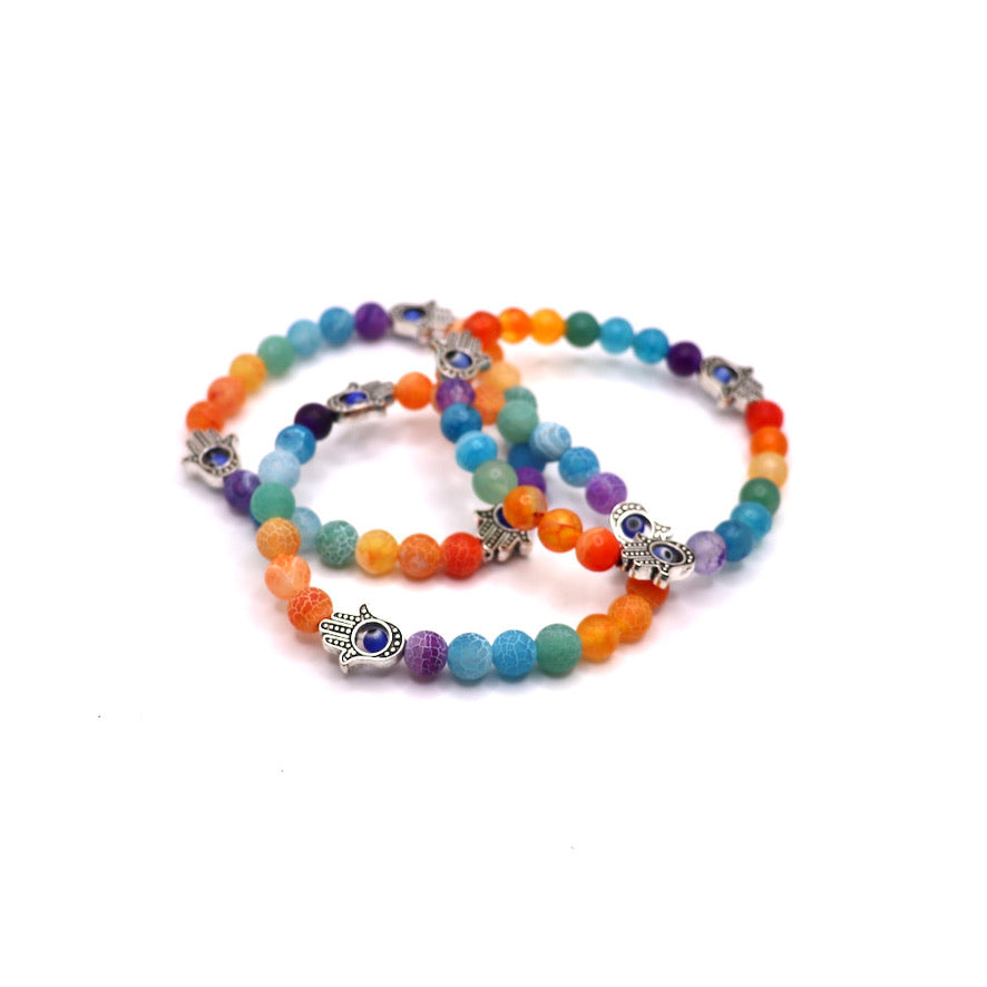 7 chakra bracelet made with cracked agate beads and fatima hand (hand of hamsa) charms