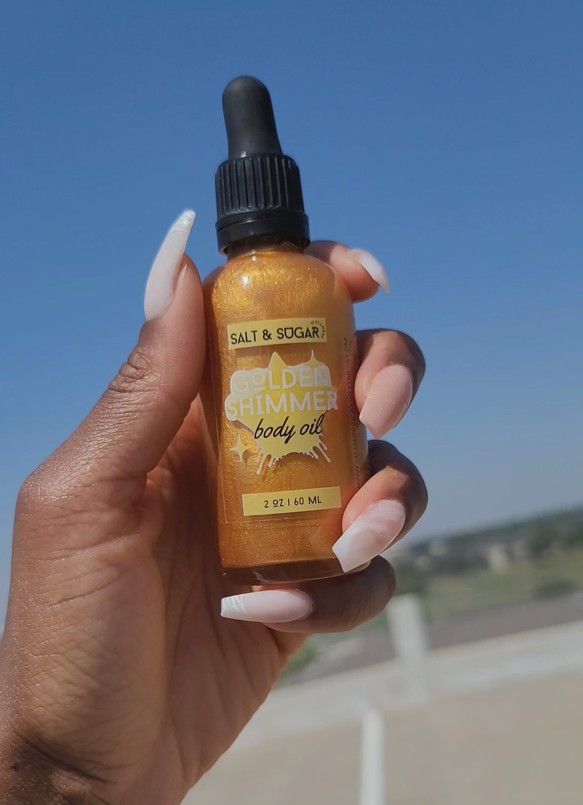 video salt and sugar wellness golden shimmer body oil 2 ounces 60 mL